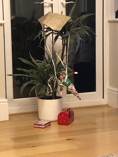 elf on the shelf arrive on a parachute